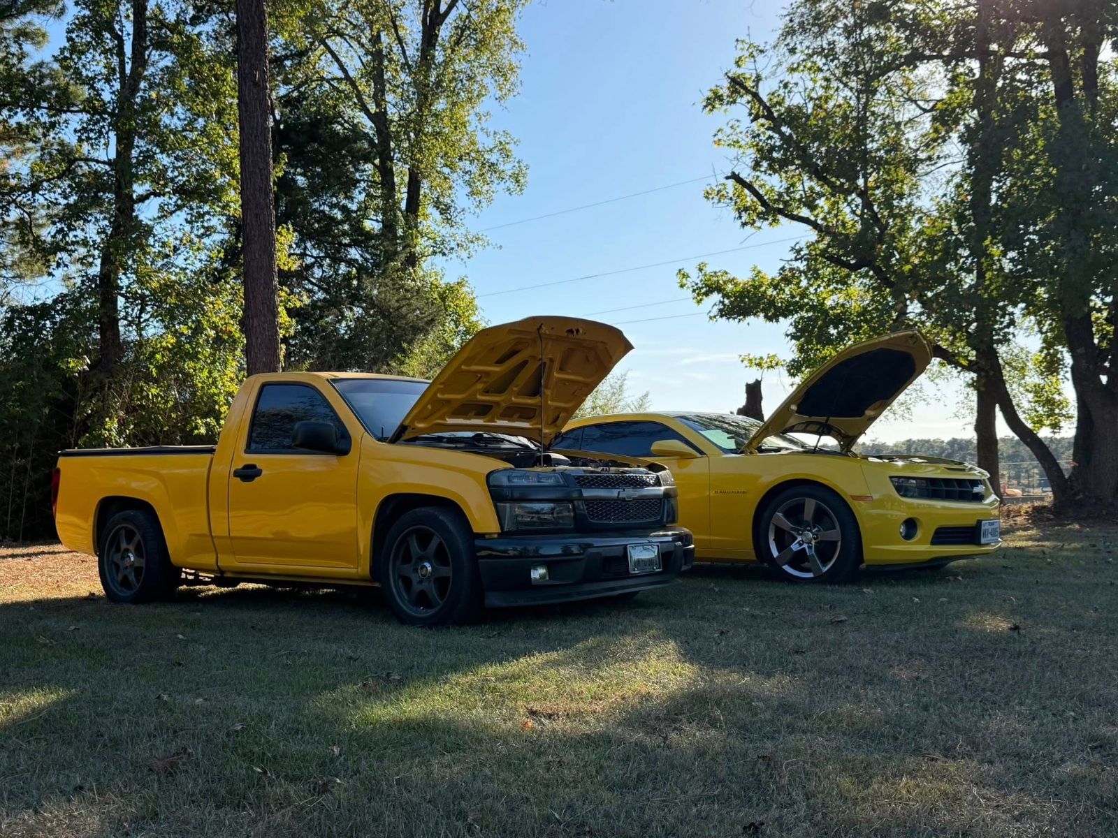A Chevy Colorado and Camaro at Red’s Speed Shop