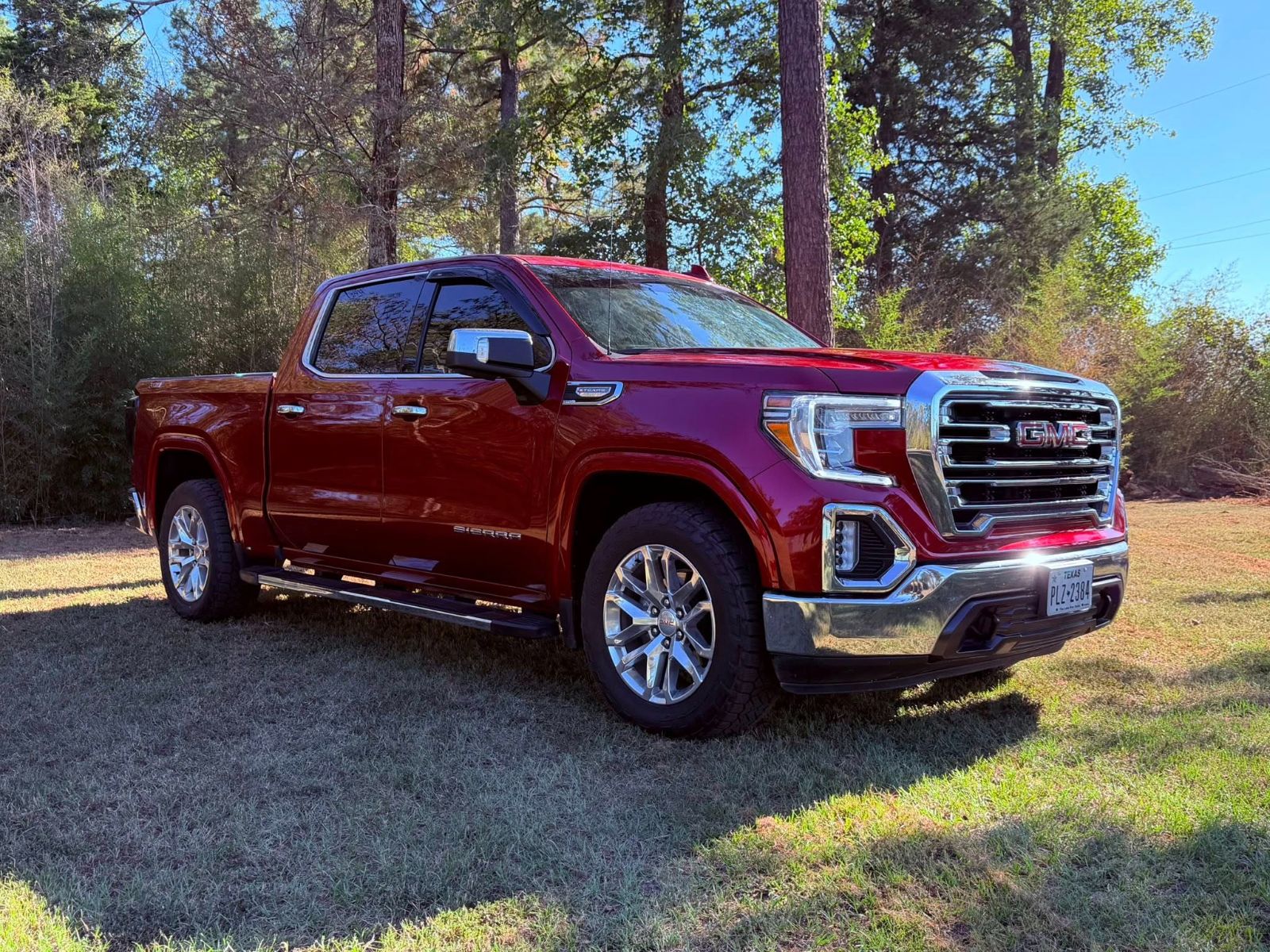 A red GMC Sierra at Red’s Speed Shop